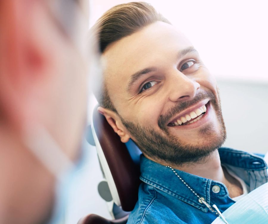 A perfect result of a dentist’s work which is seen in the beautiful and white smile on a patient who is absolutely satisfied with a result of a treatment given in a clinic.