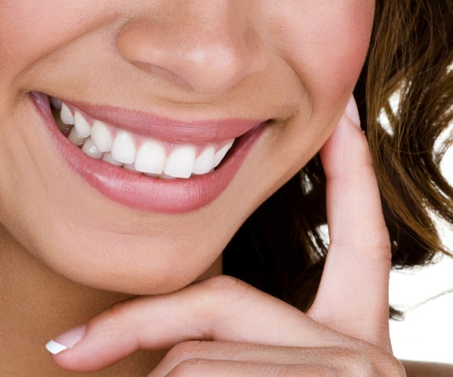 Closeup of a woman with perfect teeth smiling